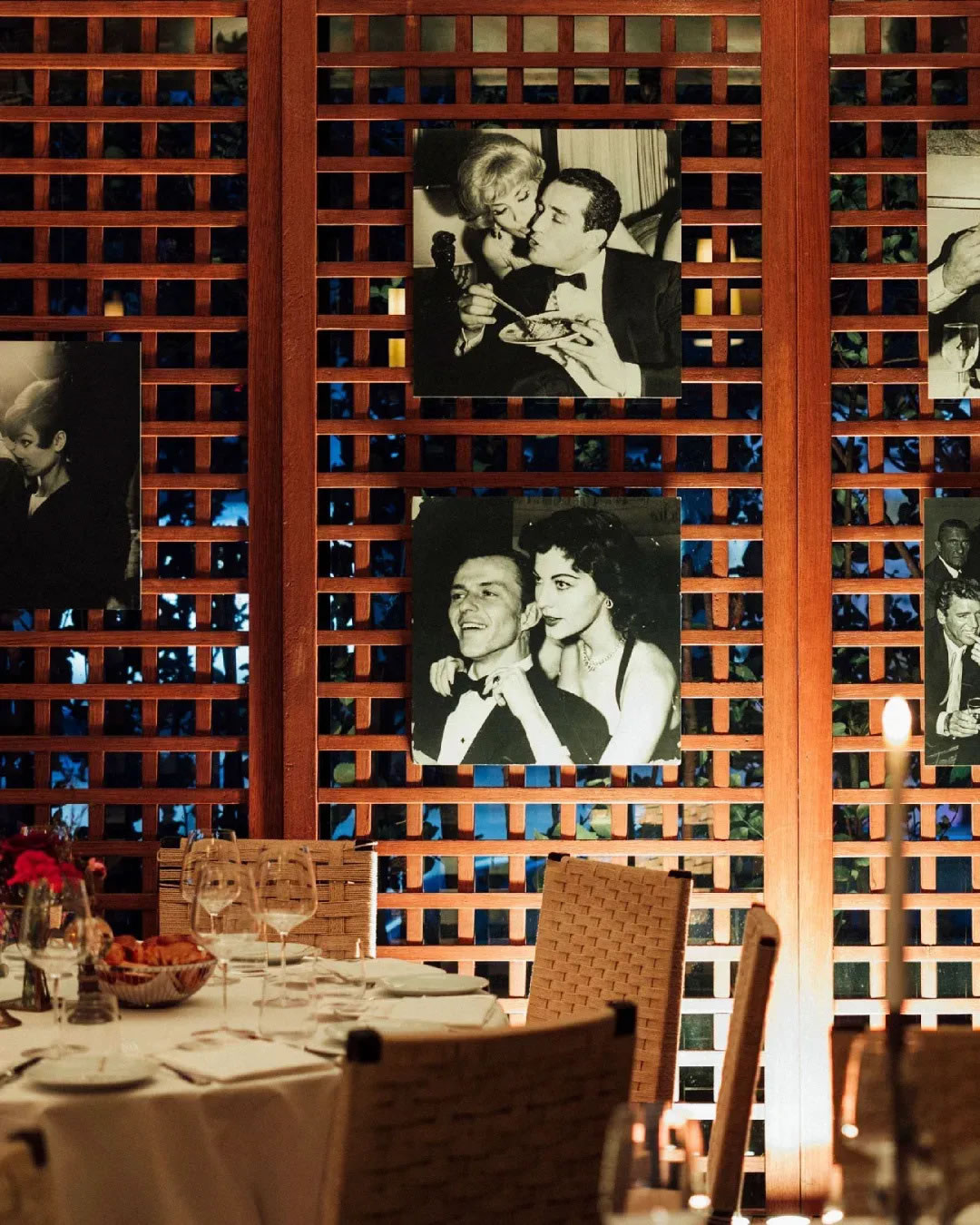 Elegant interior of Paper Moon Istanbul with warm lighting and contemporary Italian desig Elegant interior of Paper Moon Istanbul with warm lighting and contemporary Italian desig